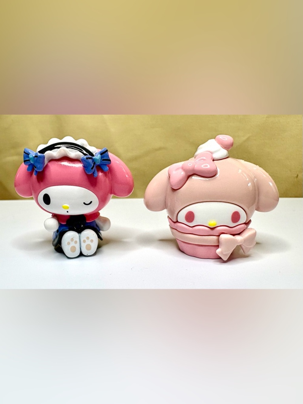 Two Sanrio Melody Love Bow blind box series (2025). Pop bean size.